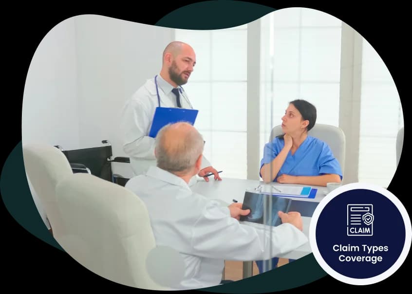 Three clinicians reviewing a case together at a conference table