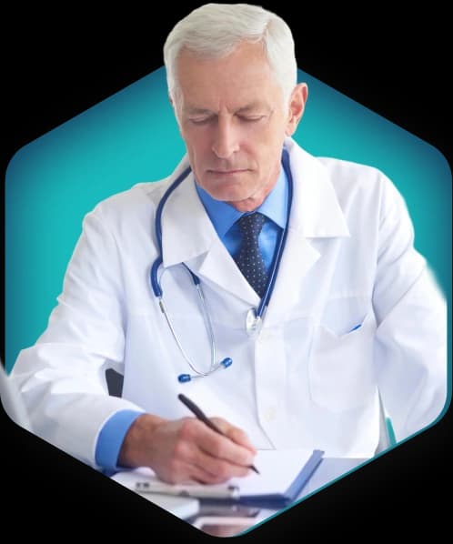 Billing specialist posting payments at a desk