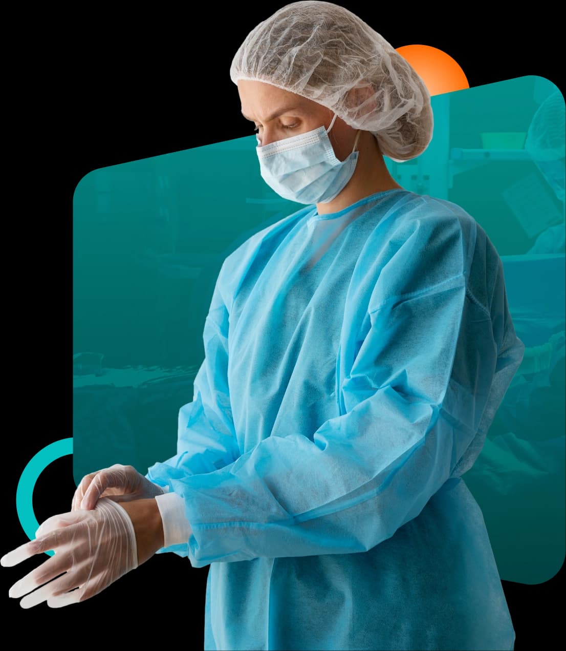 Surgeon in a gown and cap pulling on gloves before an operation