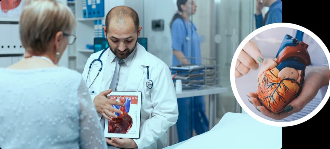 Cardiologist explaining a heart scan to a patient in a clinic