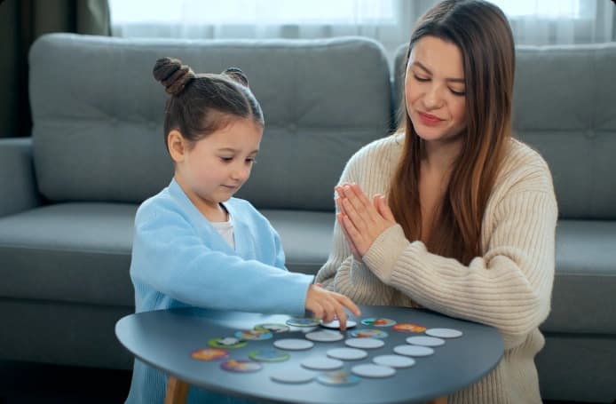 ABA therapy session between a behaviour technician and a child
