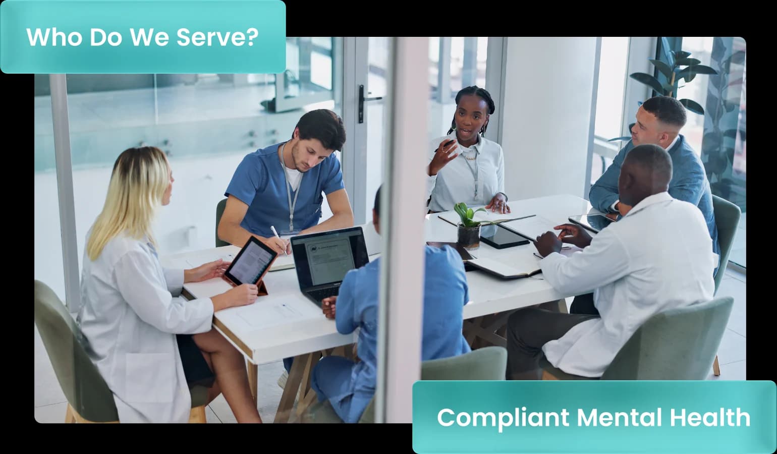 Behavioral health clinicians and administrators meeting around a conference table