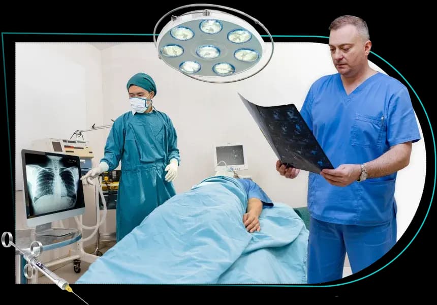 Thoracic surgeon reviewing a chest X-ray beside a patient in the operating room