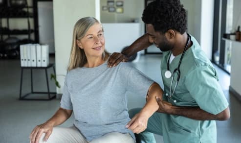Clinician supporting a chronic care management patient