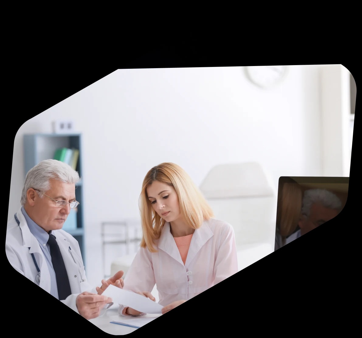 Two Dastify Solutions auditors reviewing a printed billing report together at a clinic desk