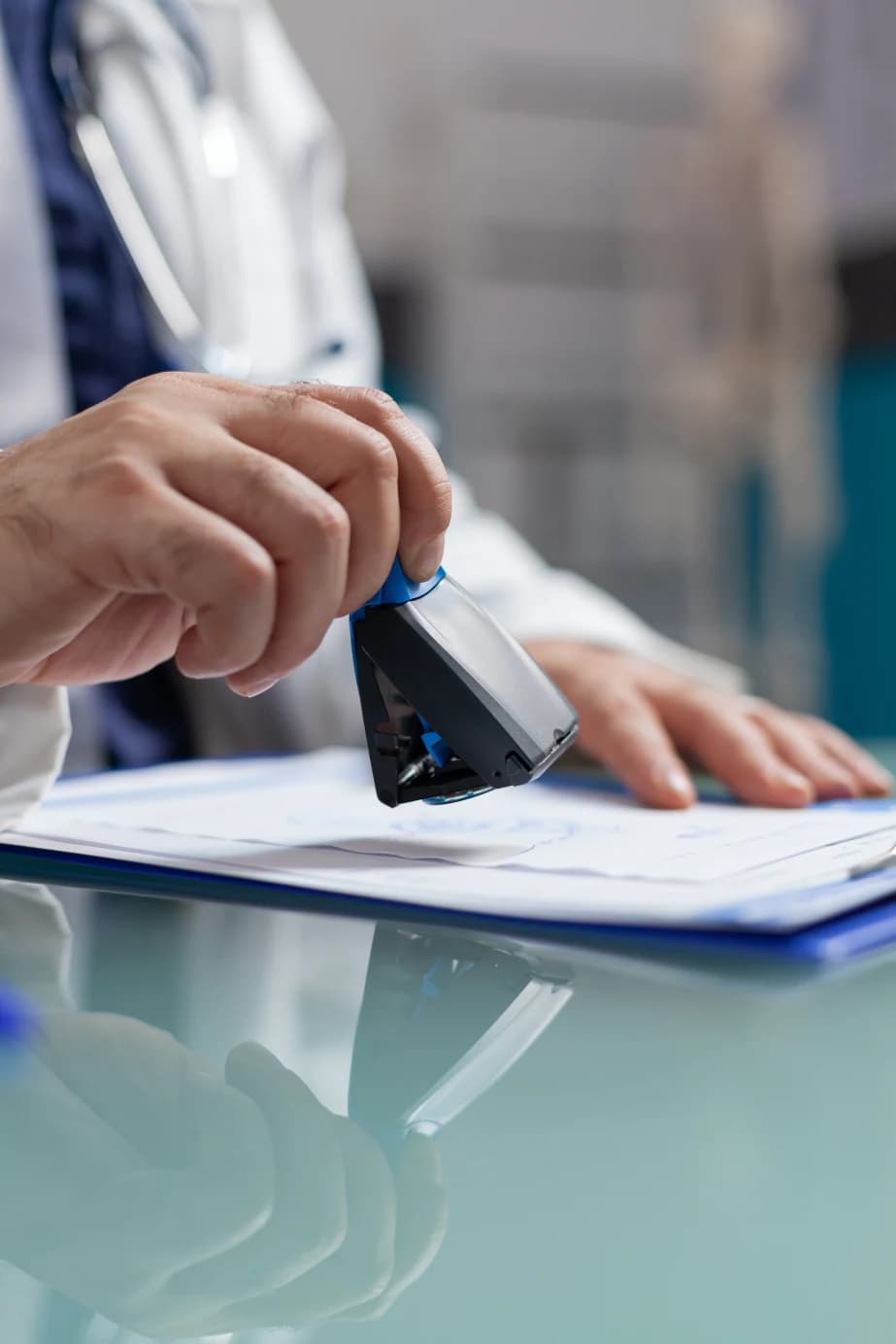 Clinician holding an approved authorization form stamped for a retroactive claim